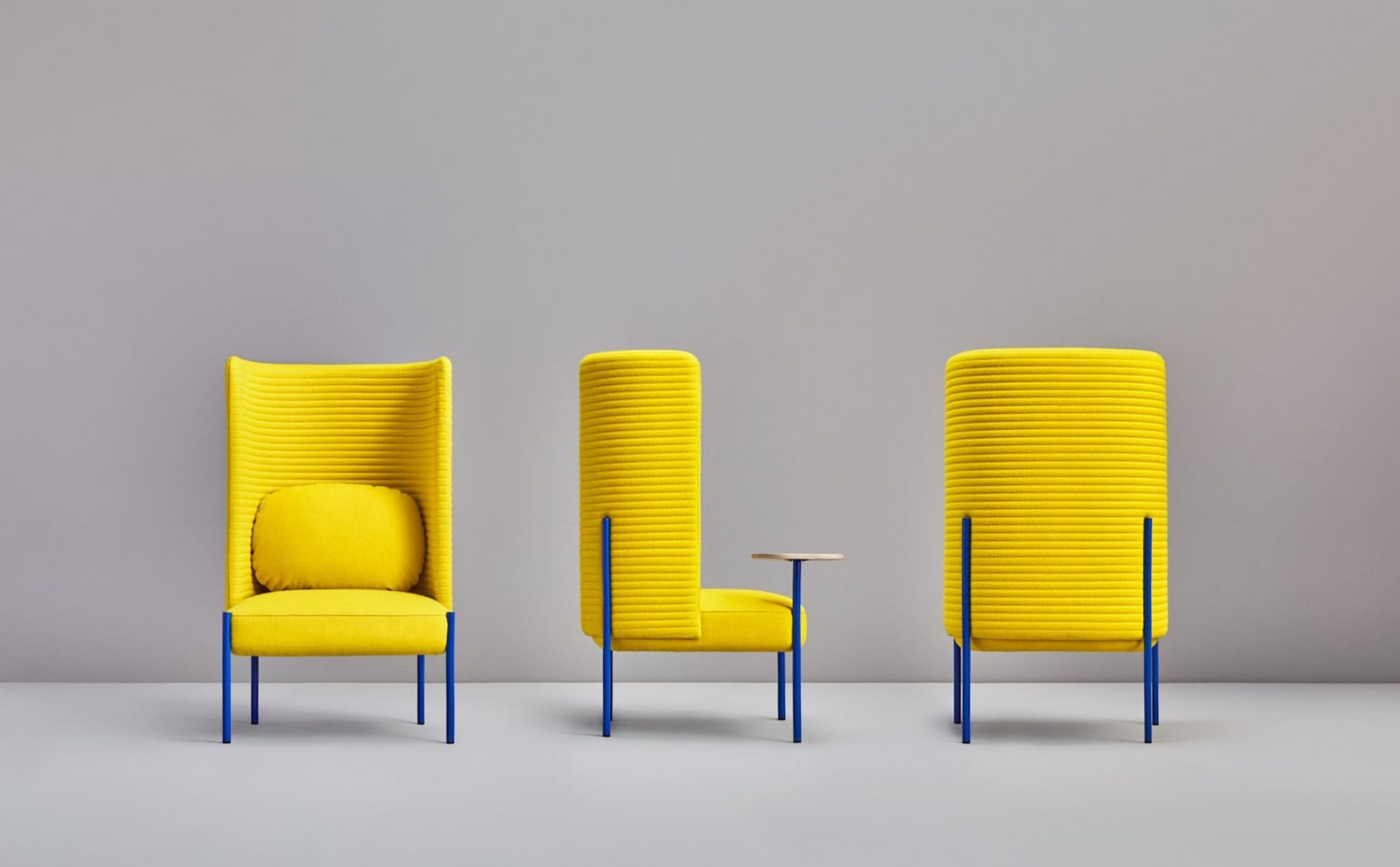 yellow bright armchair with small table